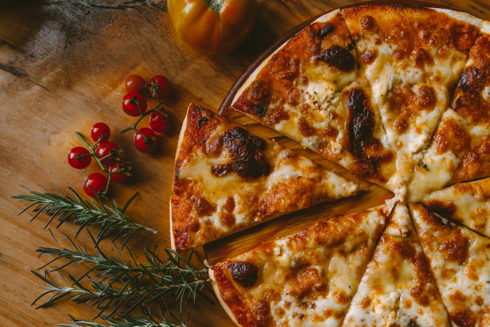 Illustrative margherita pizza photo for Blackjack Pizza & Salads.