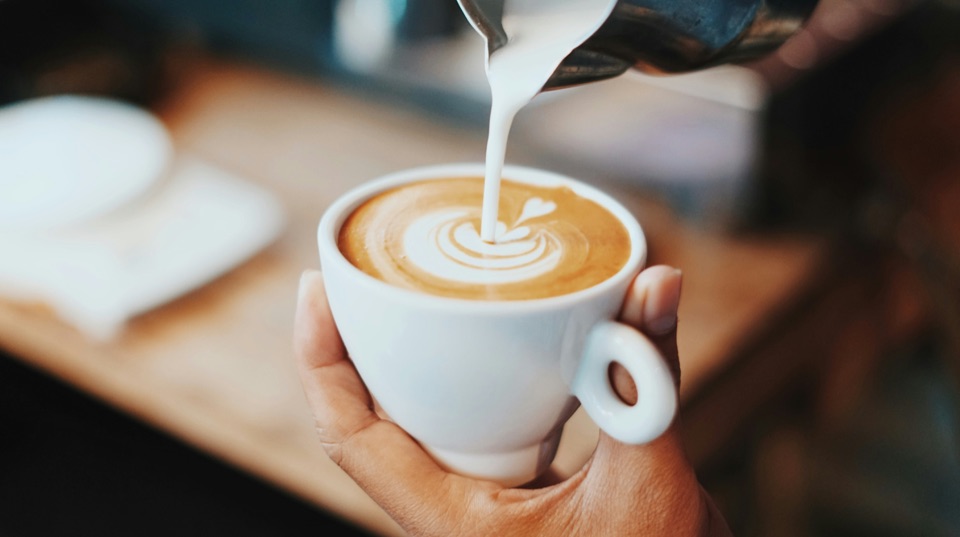 Illustrative coffee latte photo for Eagle's Nest Cafe.
